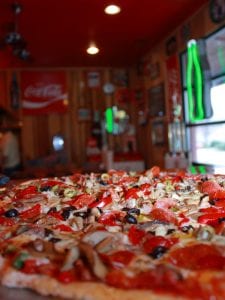 A view of supreme pizza at Sandy's Pizza.